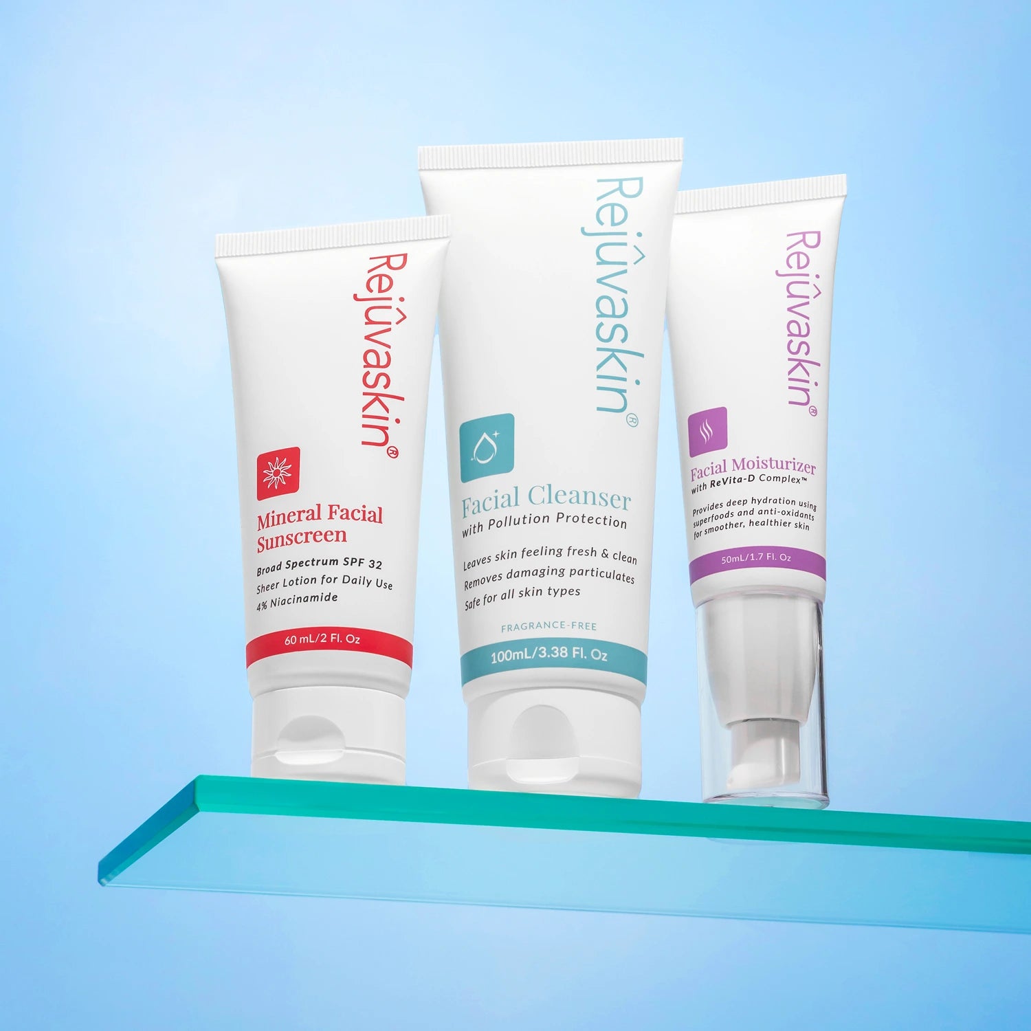 Three Rejuvaskin skincare products on a green shelf with a blue gradient background
