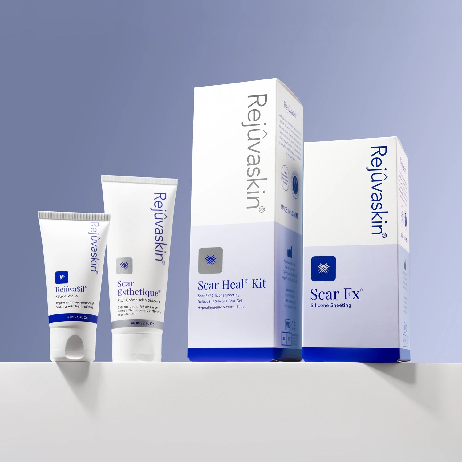 Rejuvaskin skincare products including cream tubes and boxes on a light gray background